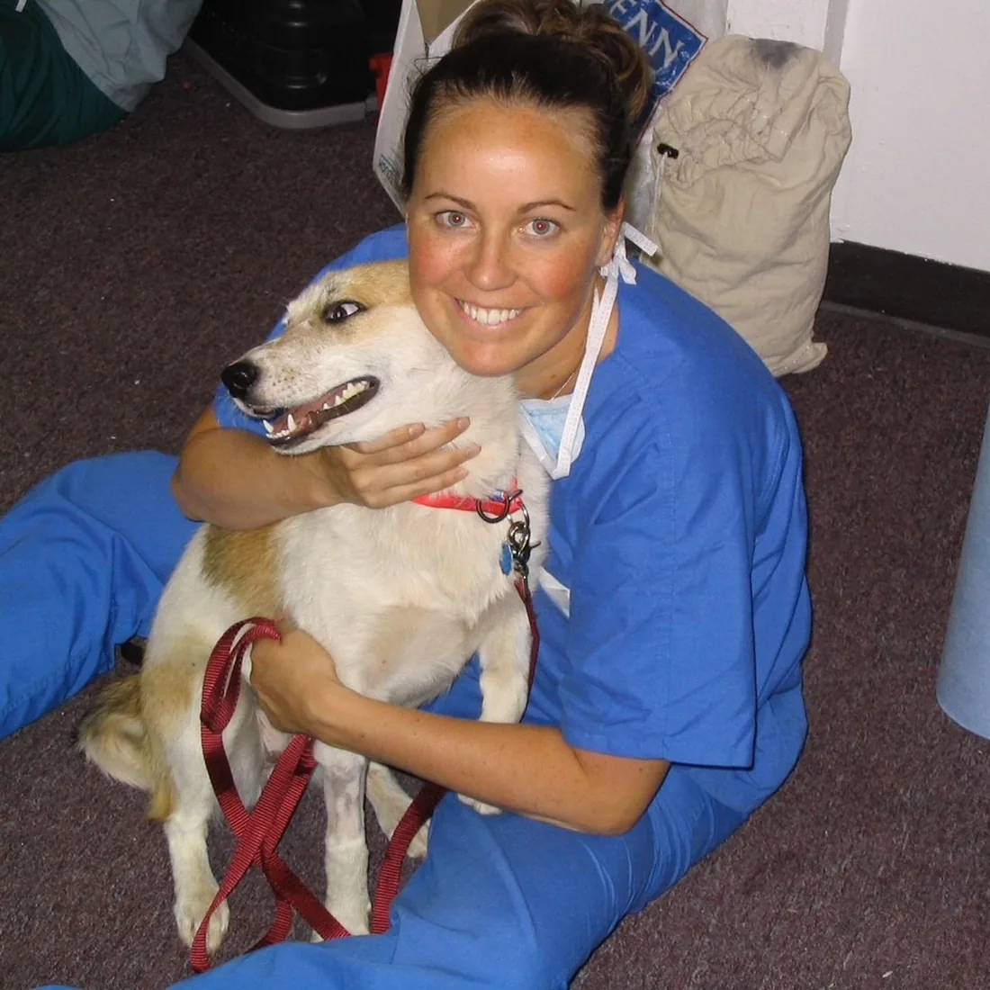 A young Dr Tara Card with her puppy, Zuni